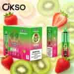 Confezione per vaporizzatore OKSO Tornado dai colori vivaci circondata da kiwi e fragole a fette, su uno sfondo di frutta vibrante.