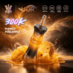 A colorful vape device labeled "Mango Pineapple" with fluid and fruit pieces around it, set against a sparkling background